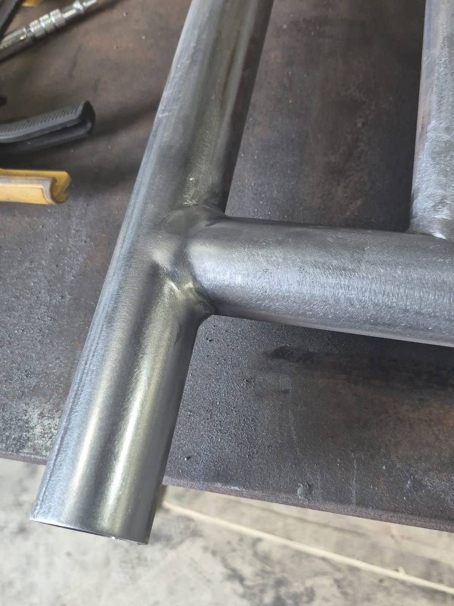 Ground and blended weld at a tube-to-tube joint on a steel frame in the Pro-Line shop in Piketon, Ohio